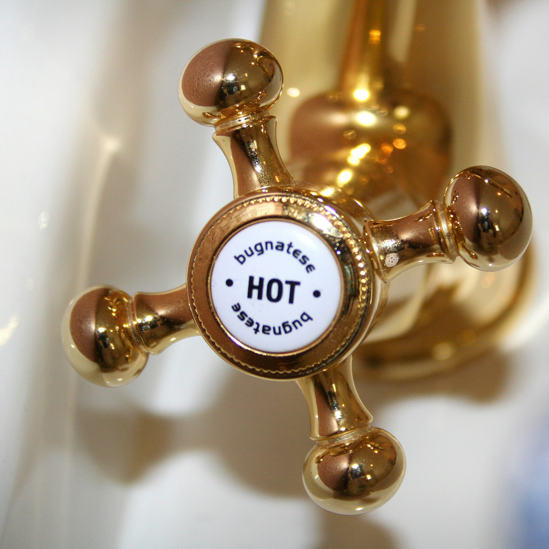 A gold or bronze hot tap.